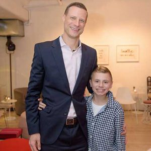 Dr. Noah De Koyer With A Patient Dr. Noah De Koyer With A Patient